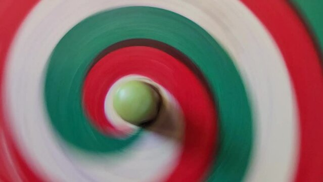 Stop motion Hypnotic Pendulum background. The rotation of the Bundle. Vestibular apparatus training. Psychedelic horizontal video backdrop. 