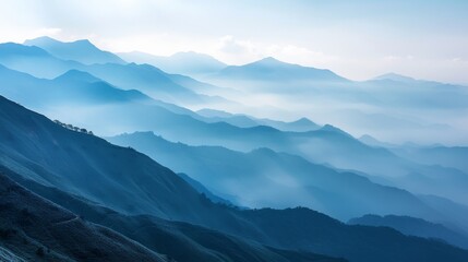 Fototapeta premium The sky is blue and the mountains are covered in trees