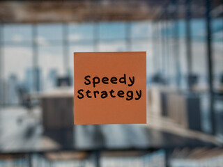 Post note on glass with 'Speedy Strategy'.