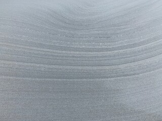 Closeup shot of textural details on sand