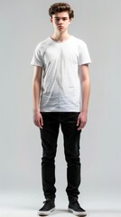 A man in a white shirt and black pants stands in front of a white background