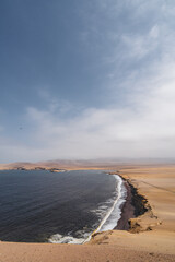red beach with storming weather in Peru