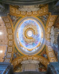 Fototapeta na wymiar Majestic interior of St. Peter's Basilica in the Vatican City