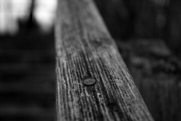 Closeup grayscale shot of a wooden surface