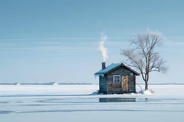 Foto op Canvas Silent Solitude: A solitary ice fishing hut stands undisturbed on the frozen expanse of an isolated winter lake © Tom