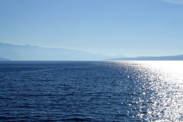 Fototapeta premium Bright blue sea and clear sky. Copy space.