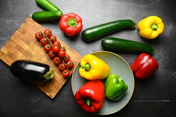 Close-up image of an array of Colorful Mediterranean vegetables zucchinis, tomatoes, sweet peppers