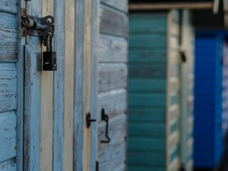 Scenic view of a padlock on a wooden beach hut