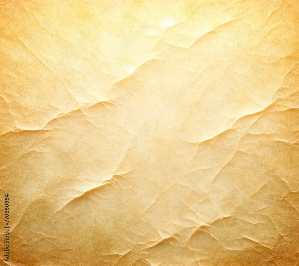 Leinwandbilder crumpled golden paper texture with soft light reflections. textured background concept generative ai