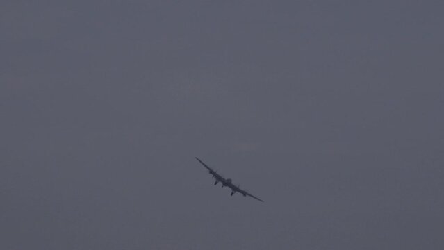 Avro Lancaster bomber world war 2 plane spitfire and Hawker Hunter in formation in the sky. Flying close to camera England UK 4K