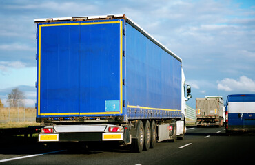 Cargo Truck On The Road In High-Speed Motion. International Logistics Shipping Delivery Concept. Speed Restriction Control Violation	