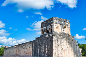 Chichén-Itzá, Yucatan Mexico - December 28 2021: Tourists walk near the Mayan pyramids in Chichen...