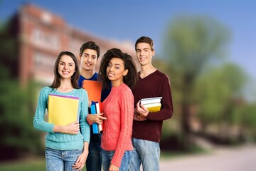 Group Of Young Students team Outdoors at University.