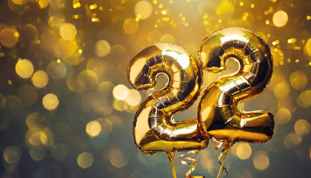 Banner with number 22 golden foil balloon. Twenty two years anniversary celebration.