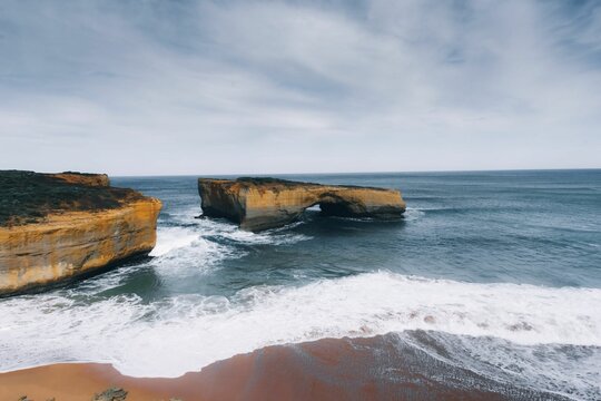 Landscape of the London Bridge on the Great Ocean Road on a gloomy day in Australia