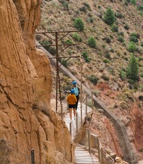 Hikers exiting the Caminito del Rey on a sunny day in Spain