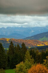 Majestic vista featuring vibrant blue and green hues, framed by a backdrop of majestic mountains