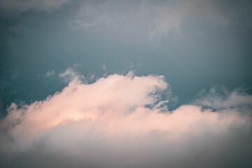 Naklejka na ściany i meble Majestic blue sky filled with fluffy white clouds, creating an idyllic background