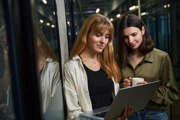 Collaboration of clothing designers creating ideas in coworking space