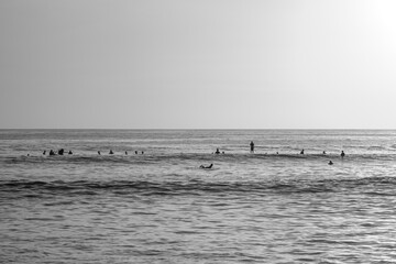 Grayscale shot of a surf line-up in a North Pacific beach in Guanacaste Costa Rica.