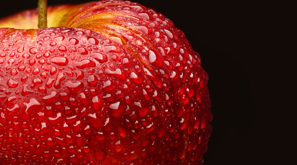 red ripe apple with drops