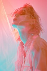 Energetic portrait of a woman cloaked in shifting lights, merging casual style with an abstract vibrancy