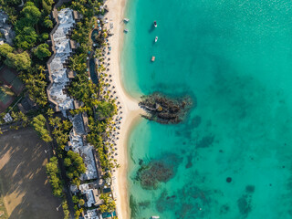 Aerial view of beautiful tropical paradise resort with turquoise water and palm trees, Royal Palm Hotel, Mauritius.