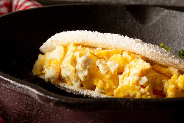Tapioca Pancake with eggs Brazilian manioc food in front view