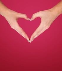 Fototapeta premium International women's concept. Woman hands heart sign