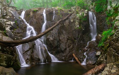Stunning landscape featuring a powerful waterfall cascading down in Shenandoah National Park, VA