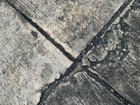 texture, background, cross on the floor of the road black line from asphalt