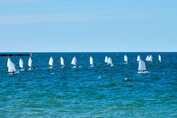 Blue sea sailing regatta, nautical spectacle sport sailing competition among yacht club...