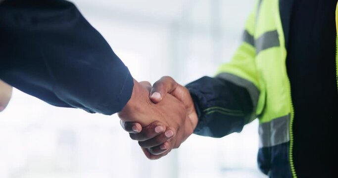 Building contractor, handshake and business people with agreement and renovation with partnership for property development. Closeup, CEO or project inspector shaking hands or architecture recruitment