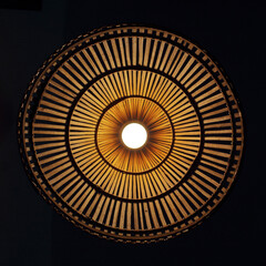 A bamboo hanging light, shot directly from below