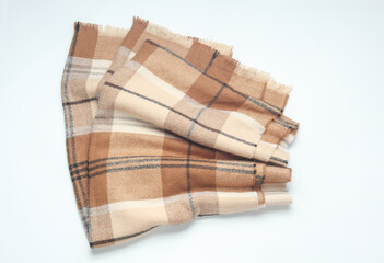 Wool checkered scarf on white background
