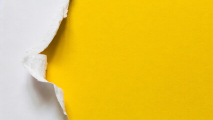 torn paper yellow background