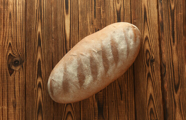 Rye bread on a wooden table. Top view