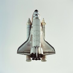 A space shuttle is flying through the sky