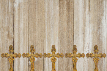  Gold cross background on weathered wood