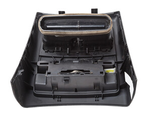 A close-up view of a part of the interior of a modern car with a view of the ventilation deflector of the heater for heating and cooling the rear passenger compartment. Used auto part catalog junkyard