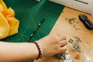 Hands of the seamstress