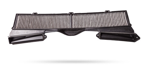 Plastic grille for the cabin air filter in black on a white isolated background for replacement...