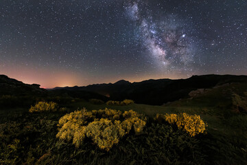 Night view of a place in the Palentina Mountain with the Milky Way in a sky full of stars and...
