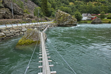 Fisher bridges on the river Flamselvi in Oyna in Norway, Europe
