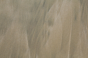 texture background, sand ripples on the beach 