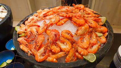 Boiled Shrimps On Big Ice Bowl In Buffet Restaurant.