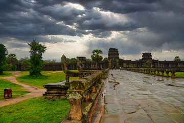 Monsoon clouds linger over the Angkor Wat Temple complex at Siem Reap, Cambodia, Asia