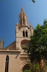 Fototapeta na wymiar Front View Of The Cathedral Santa Eulalia In Palma De Mallorca On A Wonderful Sunny Spring Day With A Clear Blue Sky