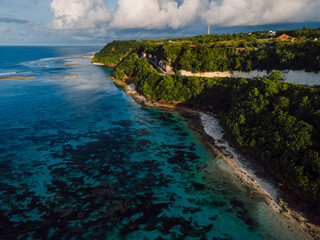 Coastline with road in rocks on Bali. Aerial view near Pandawa beach - 770876243