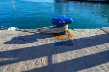 Close up of big mooring cleat on dock